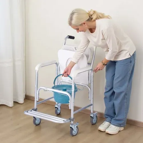 VEVOR Nachttoilettenstuhl 159 kg belastbar, rollbare Toilettensitzerhöhung mit gepolsterter Sitzfläche/Rückenlehne/hochklappbarer Fußstütze, abnehmbarer 5 L Eimer, Duschrollstuhl für Senioren – Bild 7
